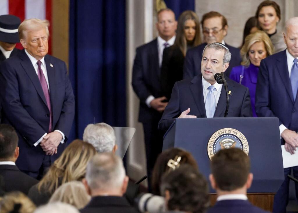 Rabbi Dr. Ari Berman (C), president of Yeshiva University, delivers a benediction as US President Donald Trump (L) and former US President Joe Biden (L) listen during President Trump’s inauguration ceremony in the rotunda of the Capitol in Washington, DC, USA, Jan. 20, 2025 