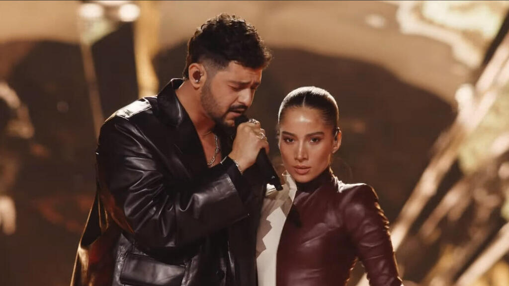 Onstage at the first semitfinal of Eurovision (Photo: Screenshot EBU) נועם בתן בחצי גמר אירוויזיון 2026