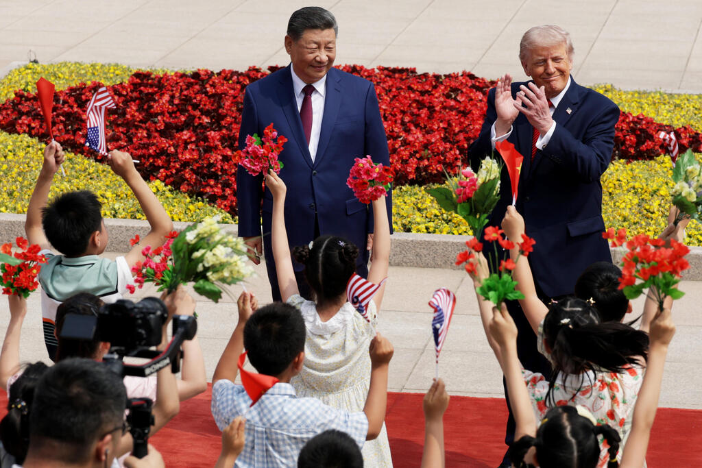 Photo: Alex Wong/Getty Images פגישתם של נשיא ארה"ב דונלד טראמפ ונשיא סין שי ג'ינפינג בבייג'ינג