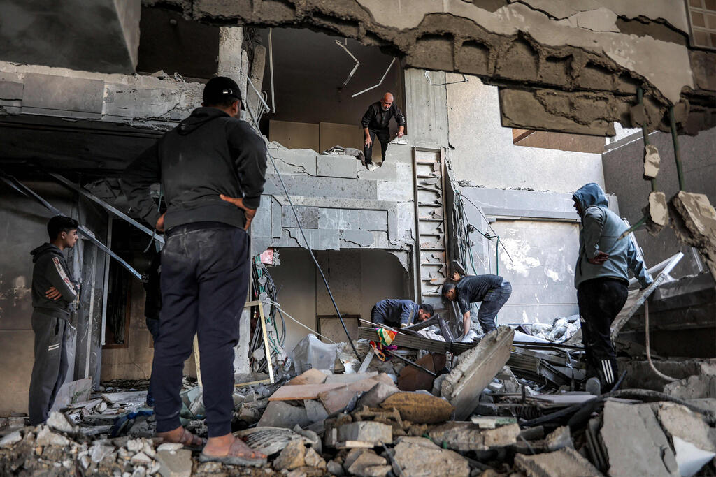 Photo: Omar AL-QATTAA / AFP זירת התקיפה בעזה