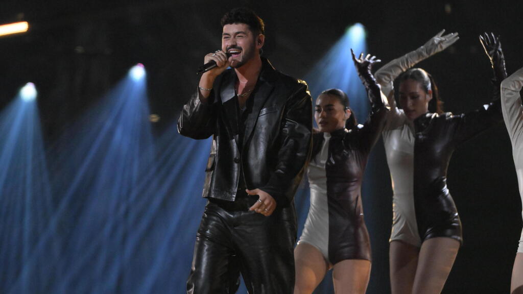 Noam Bettan performing the song 'Michelle' at the Eurovision final in Vienna .
