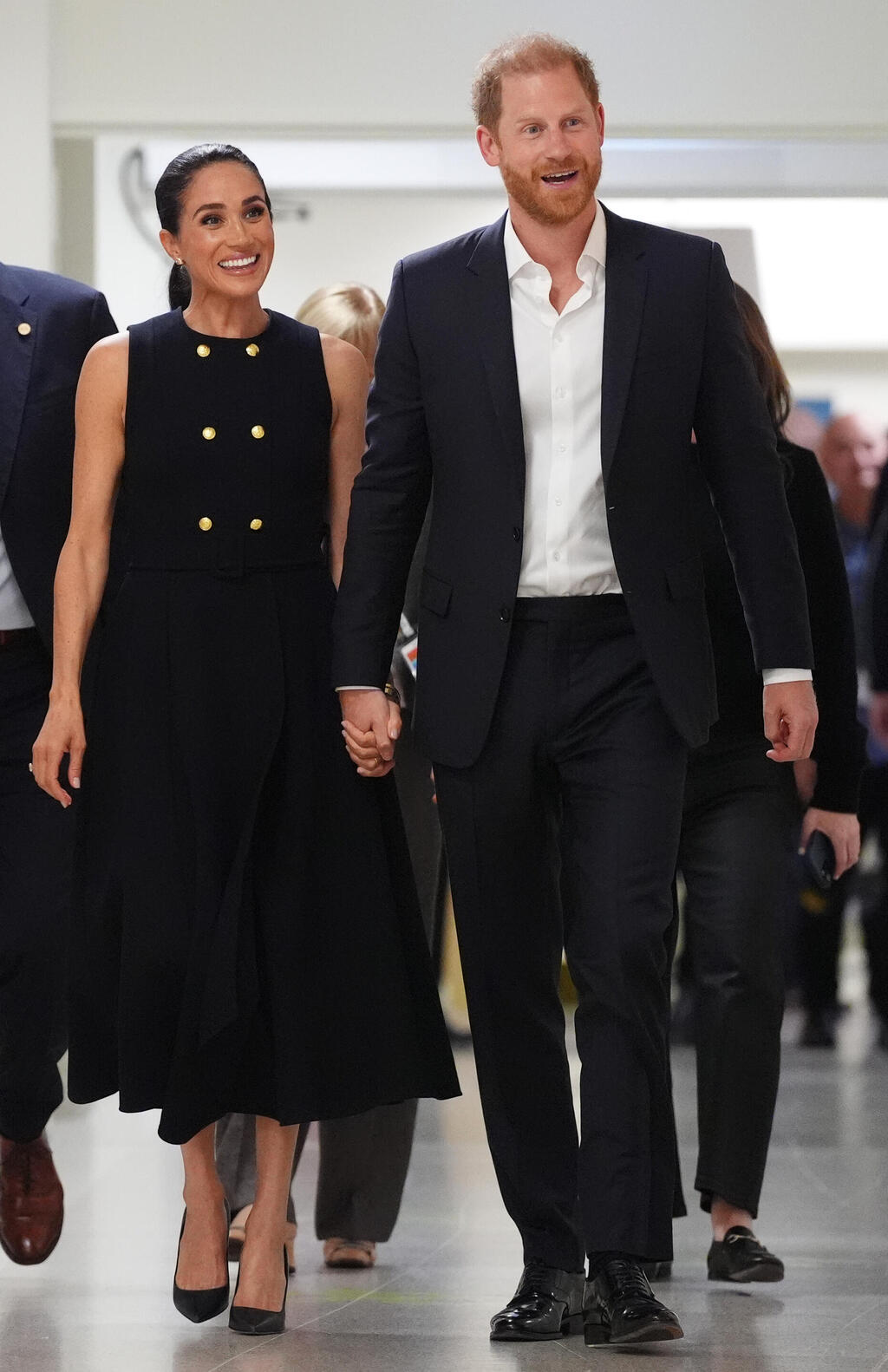 "אמרתי לך לחדול". הארי ומייגן (צילום: Jonathan Brady-Pool/Getty Images) הנסיך הארי ומייגן מרקל