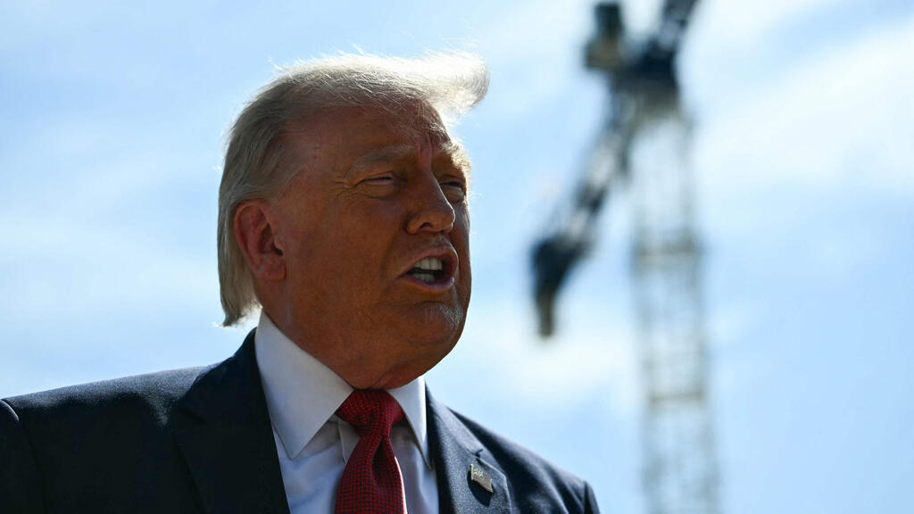 US President Donald Trump (Photo: NISHIMURA/ AFP) טראמפ עונה לשאלות כתבים מחוץ לבית הלבן