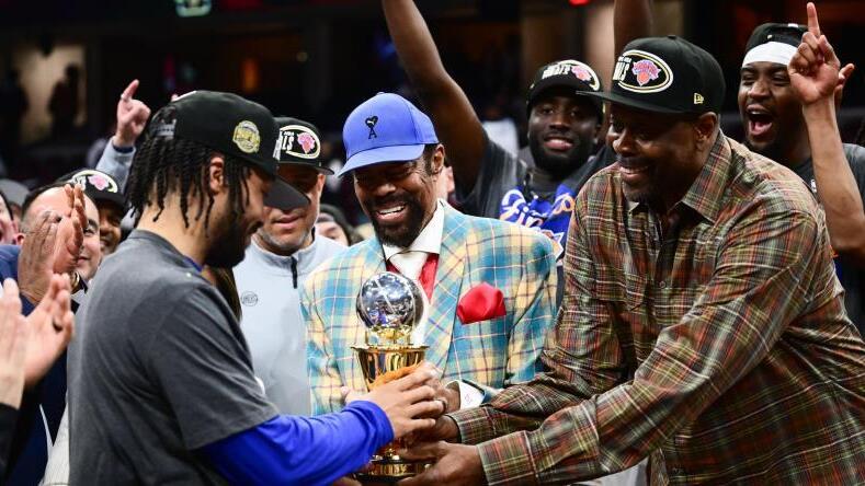 Knicks legends Patrick Ewing and Walt Frazier present the MVP trophy to Jalen Brunson