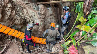  Members of a rescue team work to save seven people trapped in a cave in Xaisomboun Province, Laos; 5 of the trapped were reported to be found alive 