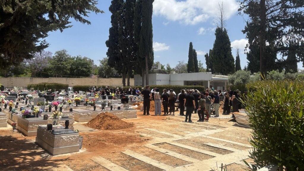 בני הזוג רוסלן ואולגה פריחודקו מובאים למנוחות