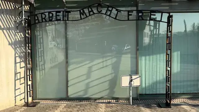  Man erects Auschwitz gate replica outside German tax office over €70,000 tax debt