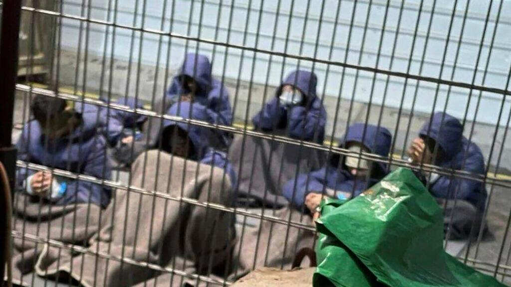 Security prisoners at the Sde Teiman detention facility (Photo: AP) אסירים ביטחוניים בשדה תימן, 2024
