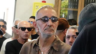 שמעון בוסקילה בהלוויתו של ישי לוי