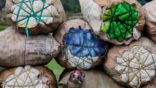 Bags filled with recyclable materials at a garbage dumping site on World Environment Day in Guwahati, India 
