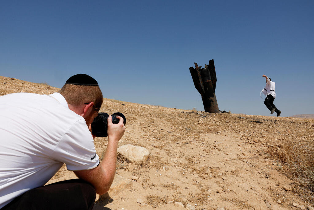 Iranian missile debris crashes in West Bank (Photo: REUTERS/Ammar Awad) פגיעה ישירה באזור יריחו