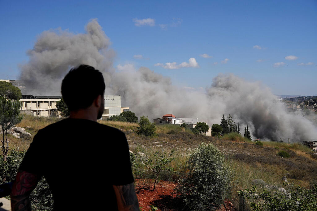 Photo: REUTERS/Stringer תקיפות צה"ל בדרום לבנון