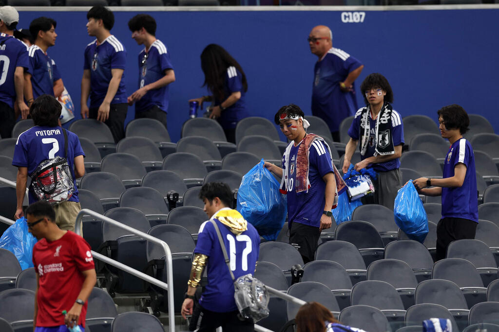 Photo: Michael Steele /Getty Images North America / AFP אוהדי נבחרת יפן