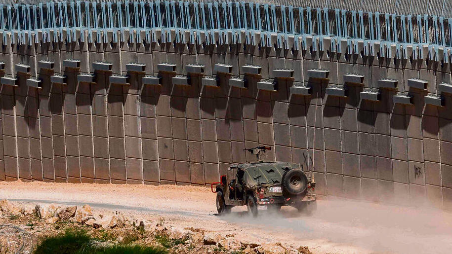 The erosion of deterrence is felt across all fronts. IDF troops patrol the Israel-Lebanon border (Photo: JALAA MAREY, AFP) שחיקת ההרתעה מקרינה על כלל הזירות. כוח צה"לי מפטרל על גבול ישראל־לבנון