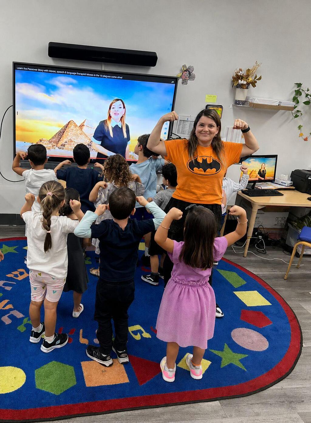 A child participates in Moran Goldschmidt's bilingual Hebrew-English storytime, which connects Israeli and Jewish families around the world through weekly online sessions (Photo: Courtesy) Moran Goldschmidt