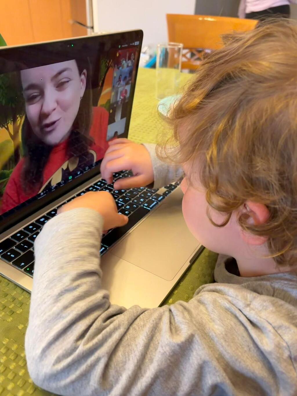 A child participates in Moran Goldschmidt's bilingual Hebrew-English storytime, which connects Israeli and Jewish families around the world through weekly online sessions (Photo: Courtesy) Moran Goldschmidt