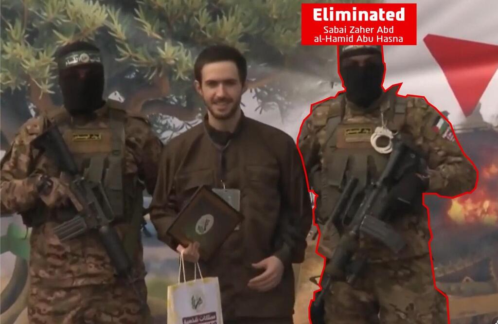 Former hostage Omer Shem Tov, center, is flanked by armed Hamas terrorists during his release ceremony in Gaza in February 2025. Israeli authorities later identified the gunman at right as Sabai Zaher Abd al-Hamid Abu Hasna, a Hamas Nukhba operative who participated in holding Shem Tov captive and was killed in an Israeli strike in northern Gaza (Photo: IDF) Former hostage Omer Shem Tov, center, is flanked by armed Hamas terrorists during his release ceremony in Gaza in February 2025. Israeli authorities later identified the gunman at right as Sabai Zaher Abd al-Hamid Abu Hasna, a Hamas Nukhba operative who participated in holding Shem Tov captive and was killed in an Israeli strike in northern Gaza