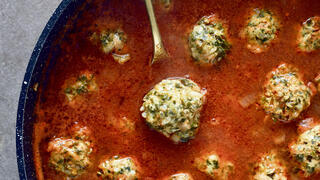 Chicken, spinach and rice meatballs in tomato sauce