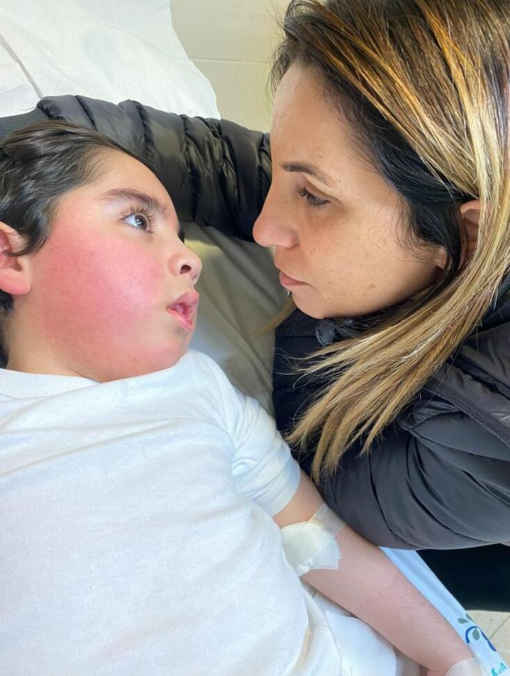 Hagit Malul with Itamar today, 11 years after the near-drowning that left him with severe brain injuries (Photo: Courtesy of the family) Hagit Malul with Itamar today, 11 years after the near-drowning that left him with severe brain injuries