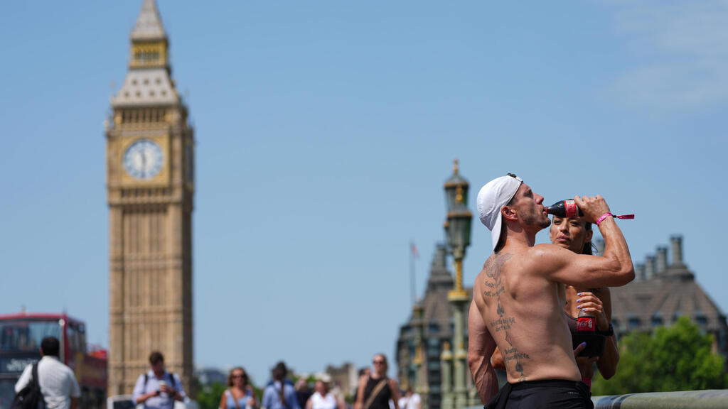 Жара в Великобритании (Фото: AP Photo/Kirsty Wigglesworth) גל חום אירופה בריטניה לונדון