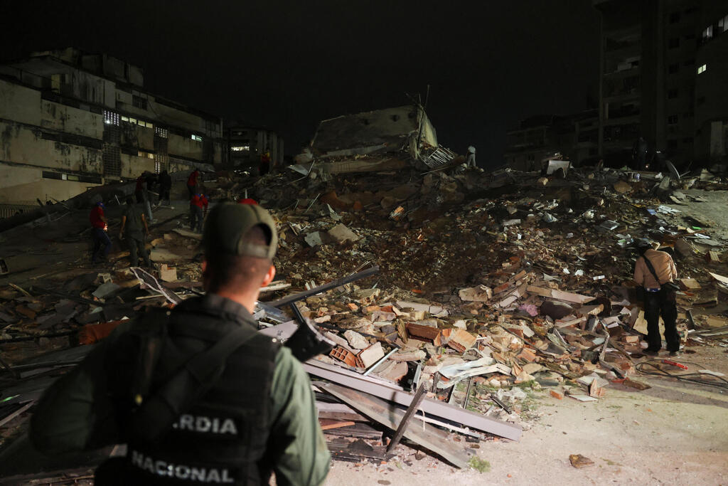 Photo: REUTERS/Leonardo Fernandez Viloria רעידת אדמה בקראקס ונצואלה