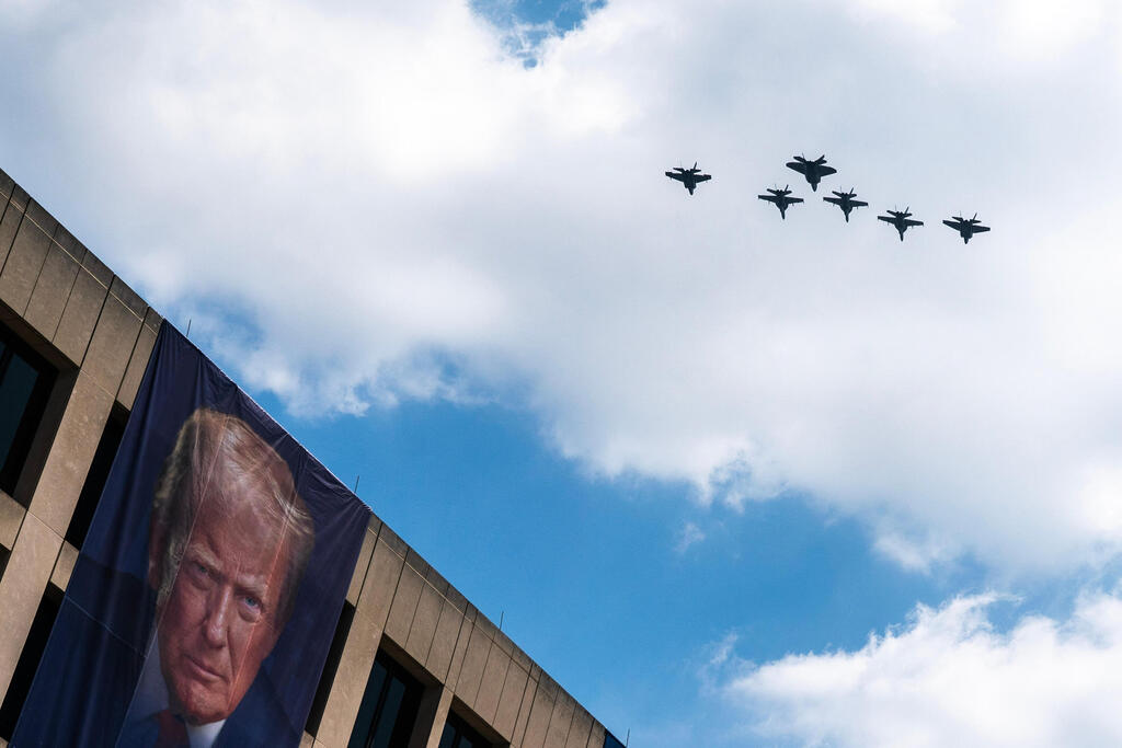 A flight of F-18s, F-35s and a F-22 fly past a picture of President Donald Trump hanging on the U.S. Department of Labor near the Great American State Fair on the National Mall, Friday, July 3, 2026, in Washington (Photo: AP Photo/Nathan Howard) A flight of F-18s, F-35s and a F-22 fly past a picture of President Donald Trump hanging on the U.S. Department of Labor near the Great American State Fair on the National Mall, Friday, July 3, 2026, in Washington