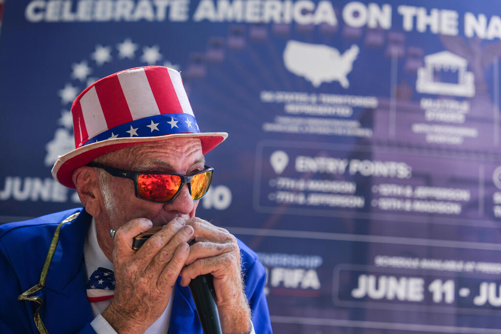 Duane Schwingel plays a harmonica on the National Mall, Friday, July 3, 2026, in Washington (Photo: AP Photo/Julia Demaree Nikhinson) Duane Schwingel plays a harmonica on the National Mall, Friday, July 3, 2026, in Washington