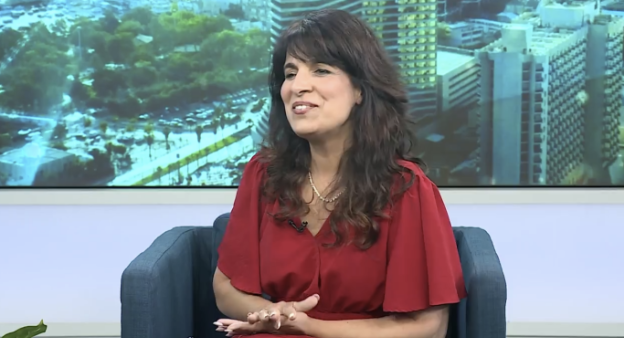 Nitsana Darshan-Leitner in the new episode, highlighting a major legal victory for terror survivor Maayan Peretz (Photo: Screengrab) All Caps ep. 17