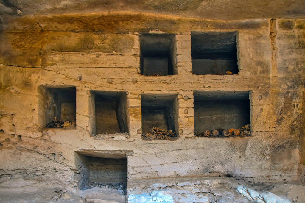 Some of the rock-cut tombs discovered at the Marina el-Alamein archaeological site, west of the Mediterranean city of Alexandria (Photo: Ministery of Tourism and Antiquities/AP) חלק מהקברים שנחצבו בסלע והתגלו באתר הארכאולוגי מרינה אל-עלמיין, ממערב לעיר הים תיכונית אלכסנדריה במצרים