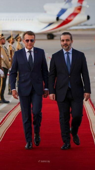 French President Emmanuel Macron (left) arrives in Damascus 