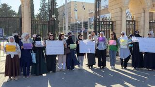 Women activists protest in Aleppo against what they say is inadequate female representation in Syria's newly formed People's Assembly 