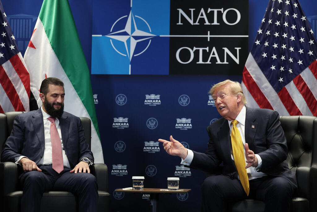U.S. President Donald Trump with Syrian President Ahmad al-Sharaa at the NATO summit in Turkey (Photo: Win McNamee/Getty Images) נשיא ארה"ב דונלד טראמפ עם נשיא סוריה אחמד א-שרע בפסגת נאט"ו בטורקיה