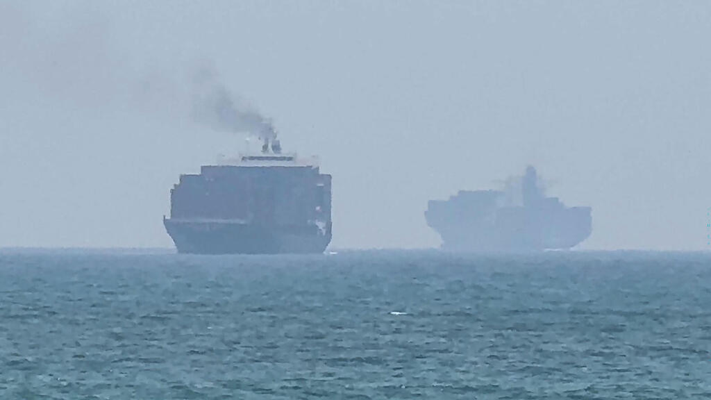 The Strait of Hormuz (Photo: AFPTV / AFP) ספינות כלי שיט באזור איחוד האמירויות סמוך ל מצרי הורמוז