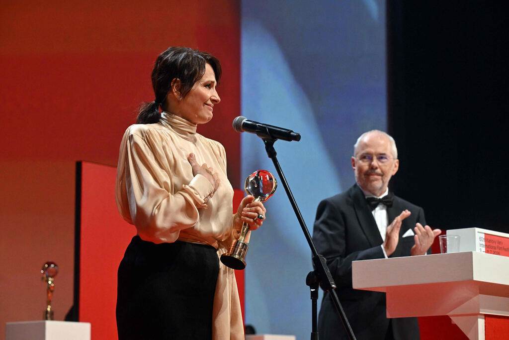 Juliette Binoche (Photo: MICHAL CIZEK/AFP) ז'ולייט בינוש