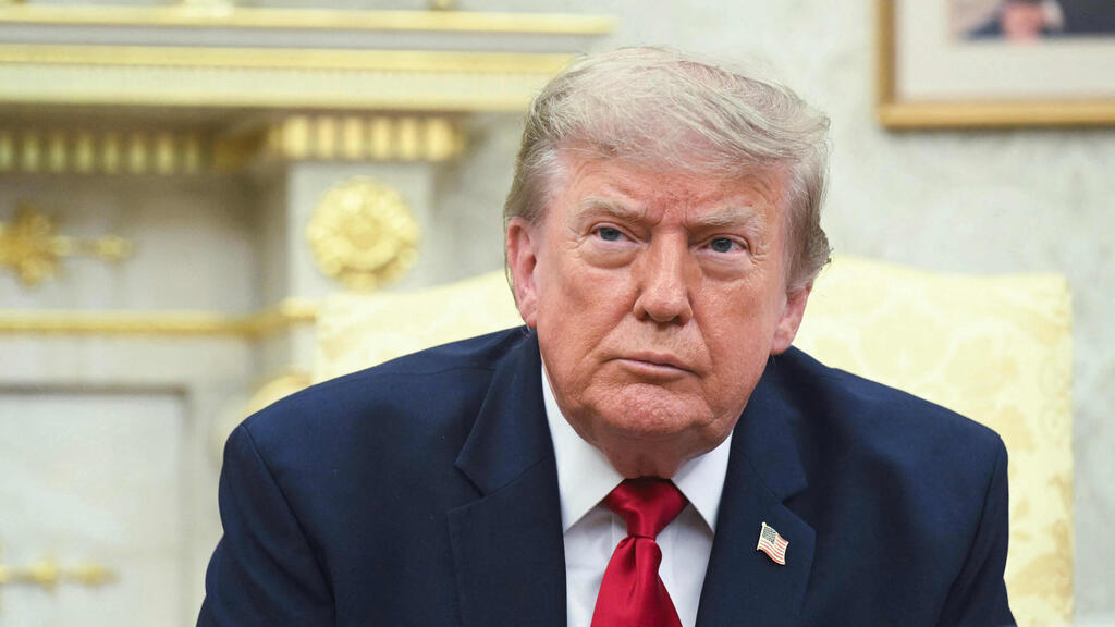 US President Donald Trump (Photo: Saul Loeb/ AFP) טראמפ וראש ממשלת עיראק החדש עלי א-זיידי