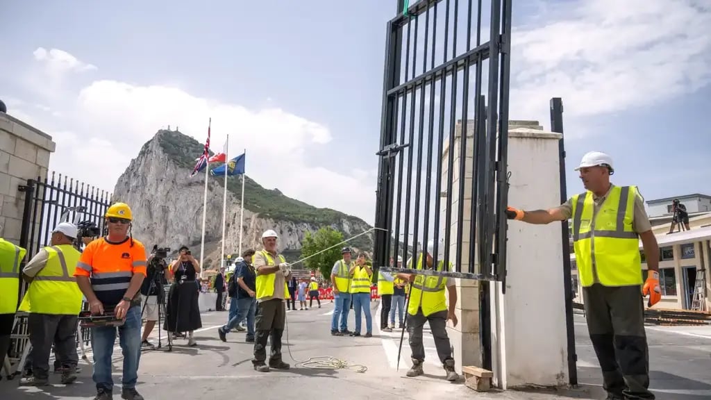 Workers remove the fence at the border crossing between Gibraltar and Spain (Photo: Marcos Moreno/AP) Workers remove the fence separating the disputed British overseas territory from Spain on the first day of passport-free travel under a new EU-U.K. treaty, at the border crossing between Gibraltar and Spain in La Línea de la Concepción, Spain, Wednesday, July 15, 2026