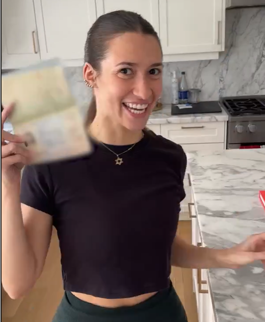 Danielle Adessky after receiving her aliyah visa (Photo: Screenshot) Aliyah