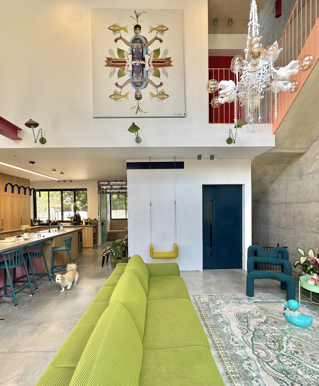 A double-height space filled with art (Photo: Tili Sharon) הדירה של דנה רייזין