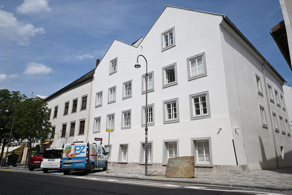 Vehicles are parked outside the building where Adolf Hitler was born, which has been converted into a police station by Austria's government in hopes of preventing it from serving as a place of pilgrimage for neo-Nazis, in Braunau am Inn, Austria, July 16, 2026 (Photo: REUTERS/Angelika Warmuth) Vehicles are parked outside the building where Adolf Hitler was born, which has been converted into a police station by Austria's government in hopes of preventing it from serving as a place of pilgrimage for neo-Nazis, in Braunau am Inn, Austria, July 16, 2026