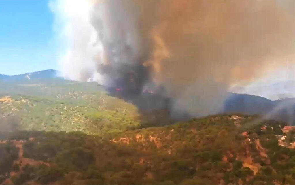 The wildfires west of Madrid (Photo: AFP / SPAIN'S GUARDIA CIVIL / HANDOUT) שריפה באזור סבררוס ליד אבילה בספרד