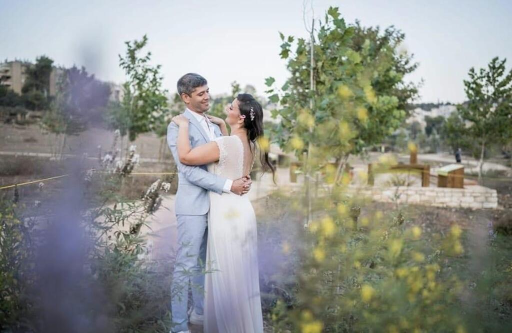 Avner Rinot, the Society for the Protection of Nature in Israel's urban nature survey coordinator and ecology surveyor, and his wife, Maya, during a pre-wedding photo shoot at Jerusalem's Gazelle Valley Park, where they first met (Photo: Yahel Sharvit) Avner Rinot, the Society for the Protection of Nature in Israel's urban nature survey coordinator and ecology surveyor, and his wife, Maya, during a pre-wedding photo shoot at Jerusalem's Gazelle Valley Park, where they first met