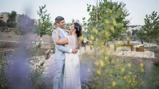 Avner Rinot, the Society for the Protection of Nature in Israel's urban nature survey coordinator and ecology surveyor, and his wife, Maya, during a pre-wedding photo shoot at Jerusalem's Gazelle Valley Park, where they first met 