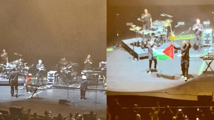 דדי ג'י ורוברט דל נאג'ה מלהקת מאסיב אטאק אוחזים בדגל פלסטין במהלך ההופעה בסיגנפור