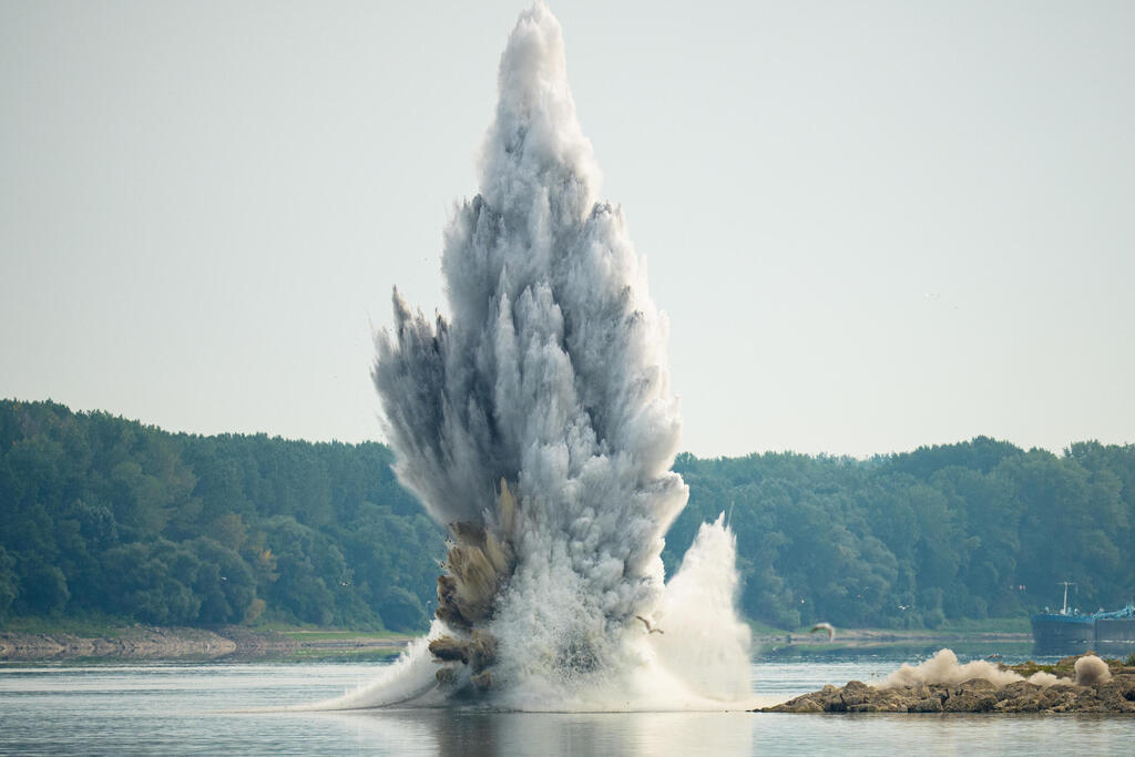 The controlled explosion in the river in Romania on Monday (Photo: AP Photo/Andreea Alexandru) The controlled explosion in the river in Romania on Monday