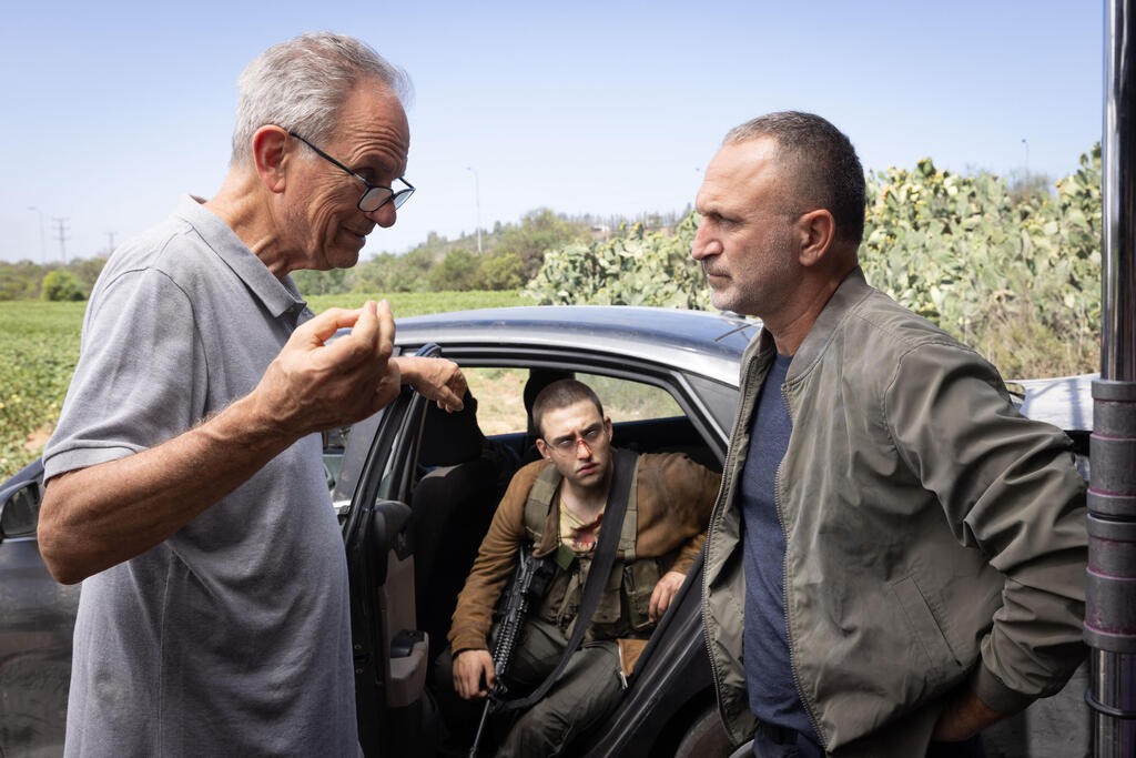 Avi Nesher and Shalom Michaelashvili on the set of Our Loves (Photo: Michal Pattael) אבי נשר ושלום מיכאלשווילי בסט של "האהבות שלנו"