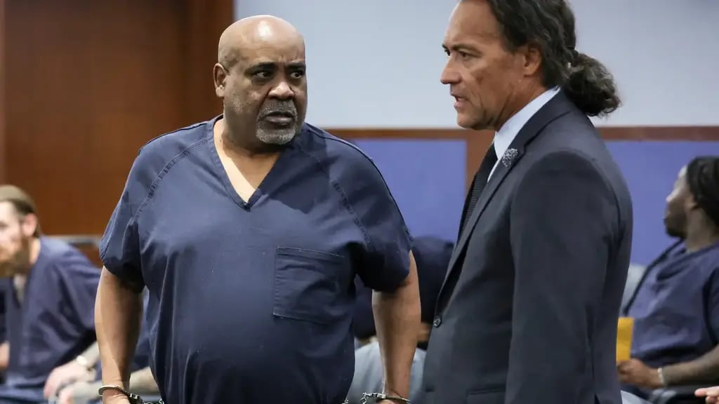Duane Davis, left, talks with his attorney Michael Sanft in Clark County District Court during a calendar call and motion hearing for Davis’ upcoming trial (Photo: AP) Duane Davis, left, talks with his attorney Michael Sanft in Clark County District Court during a calendar call and motion hearing for Davis’ upcoming trial