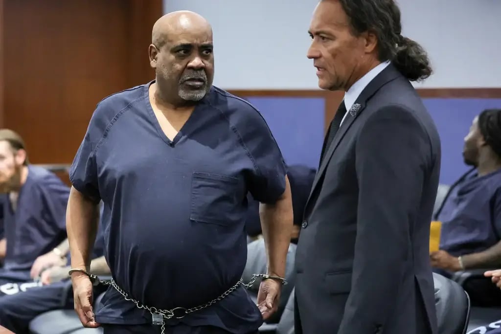Duane Davis, left, talks with his attorney Michael Sanft in Clark County District Court during a calendar call and motion hearing for Davis’ upcoming trial (Photo: AP) Duane Davis, left, talks with his attorney Michael Sanft in Clark County District Court during a calendar call and motion hearing for Davis’ upcoming trial