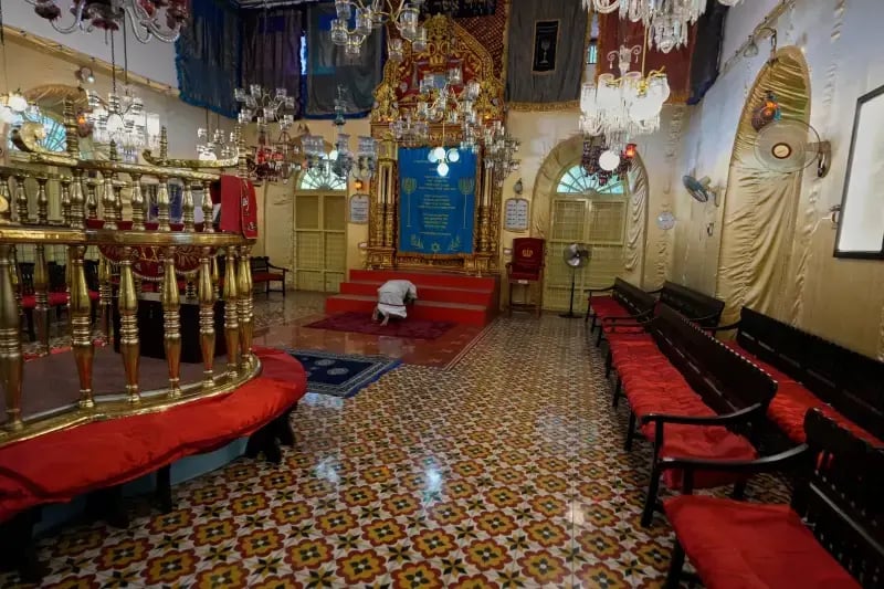 An Indian man prostrates himself in a traditional Hindu gesture of obeisance to the Torah ark during his visit to the Kadavumbagam Synagogue (Photo: AP Photo/Aijaz Rahi) An Indian man prostrates himself in a traditional Hindu gesture of obeisance to the Torah ark during his visit to the Kadavumbagam Synagogue
