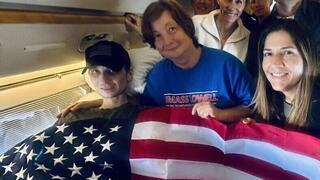 Robert Gilman on the flight home, alongside his mother. Photo posted by Trump earlier Tuesday