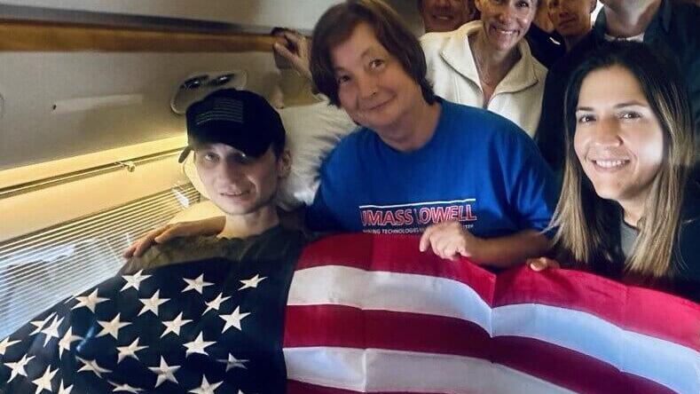 Robert Gilman on the flight home, alongside his mother. Photo posted by Trump earlier Tuesday Robert Gilman on the flight home, alongside his mother. Photo posted by Trump earlier Tuesday